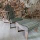 Ancient Adirondack armchair with footrest