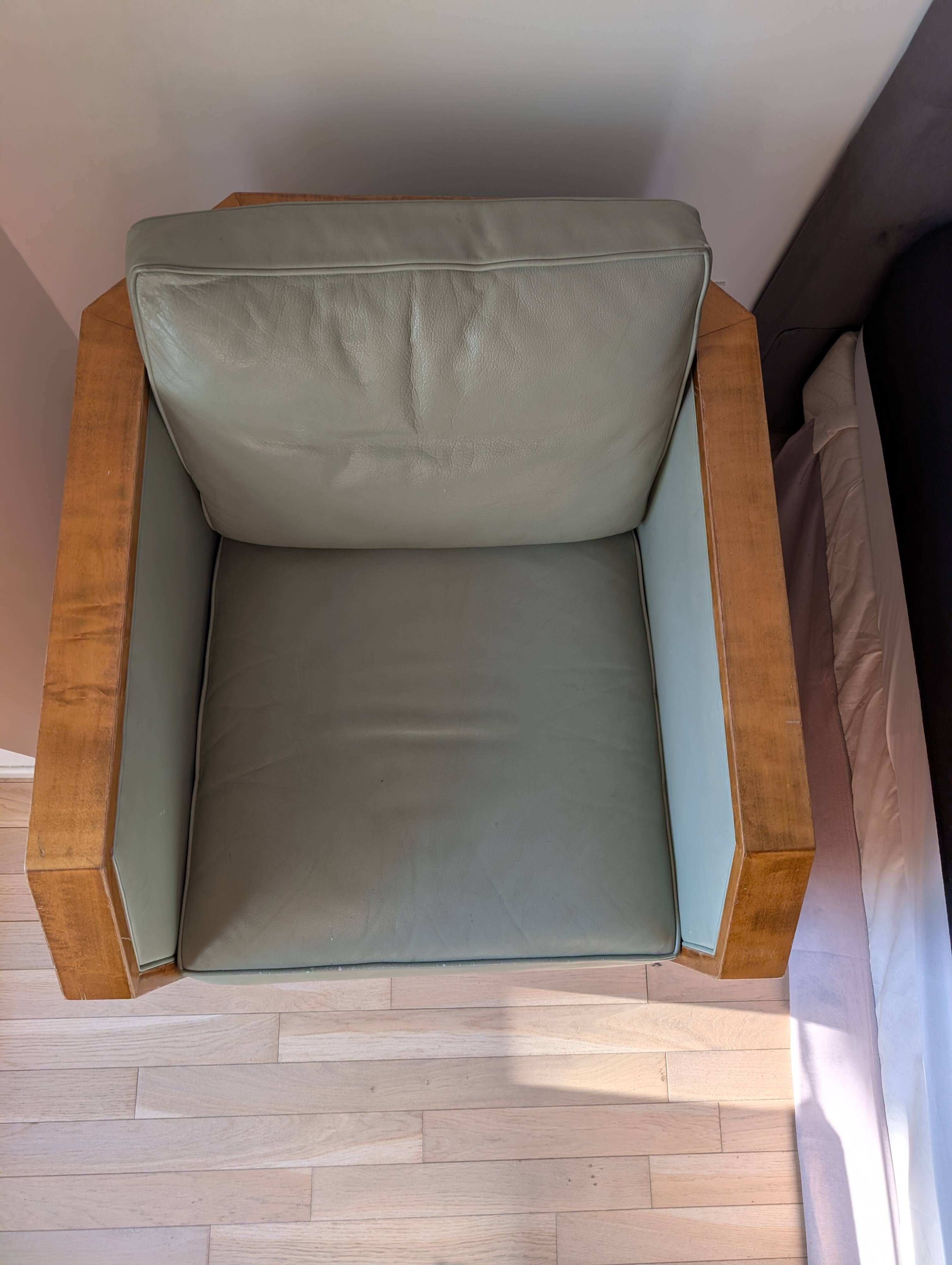 Vintage armchair Hugues Chevalier Paris — Almond green leather & Wood