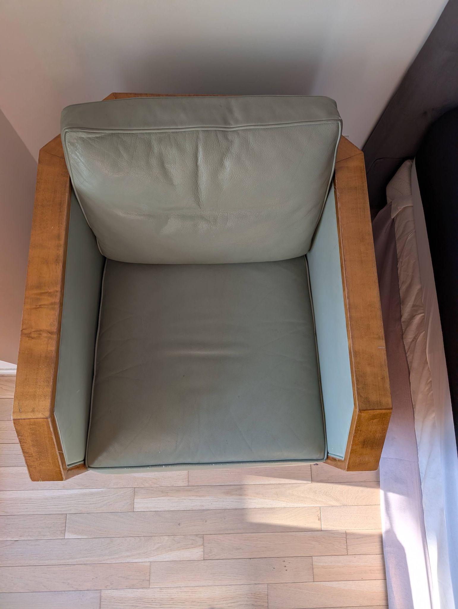 Vintage armchair Hugues Chevalier Paris — Almond green leather & Wood