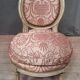 Chaise basse de style Louis XVI