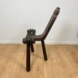 Pair of low tripod chairs in solid wood, mid-20th century.