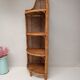 Tall rattan shelf