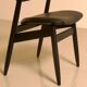 Dutch "Buffalo" armchair in wood and black leather from the 60s.