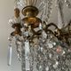Grand chandelier in Louis XV style with crystal pendants.
