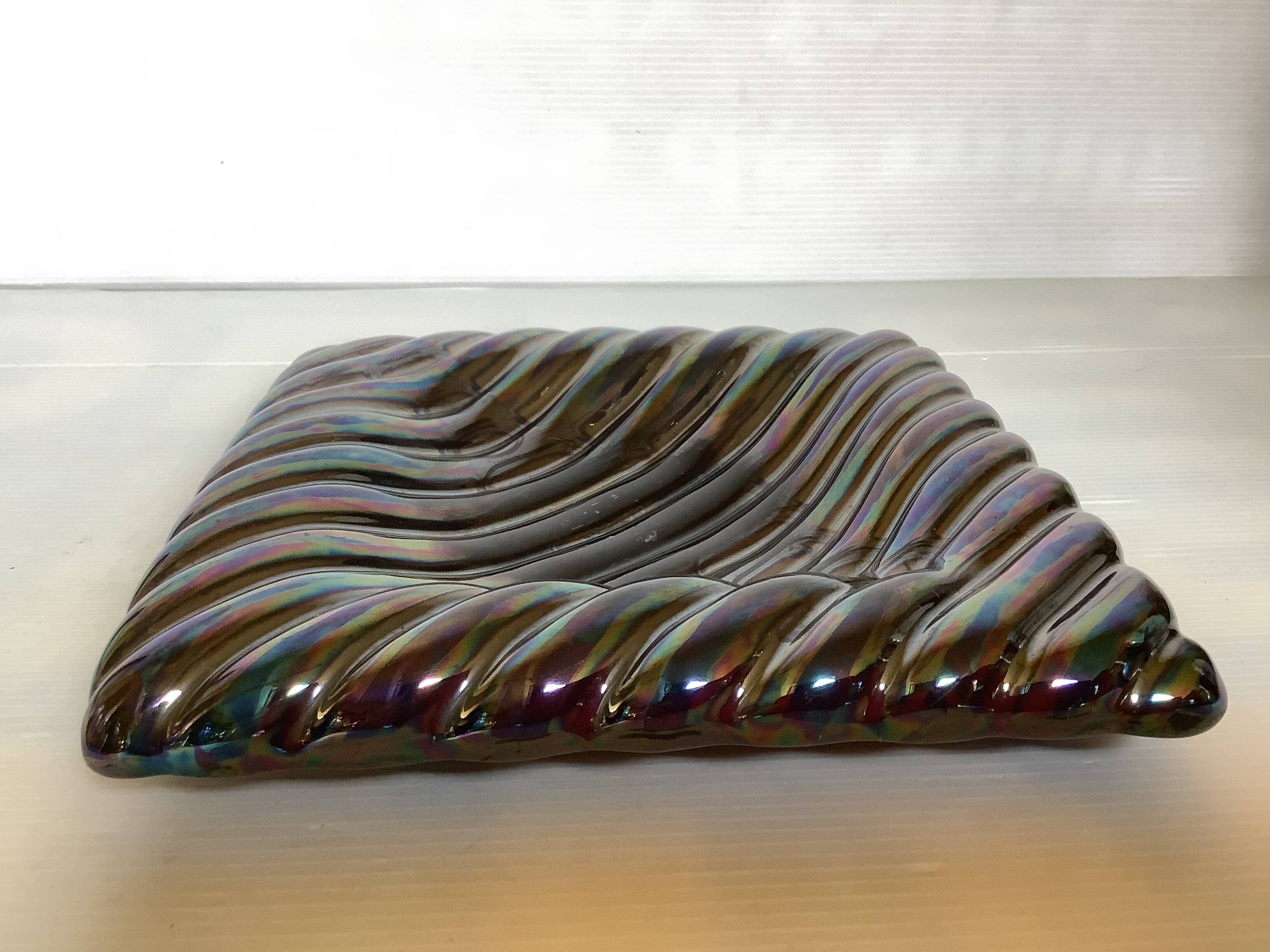 70s iridescent black pocket emptier