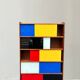 Closed bookcase in Bauhaus colors by D.Rozaffy Edition Meuble Oscar, design 1960