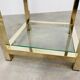 Gilded metal fifth wheel column and Hollywood Regency style glass 70s
