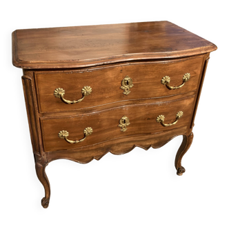 Commode sauteuse en noyer