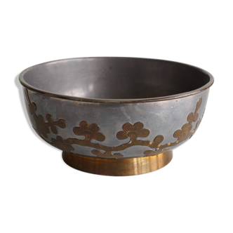 Tin and brass cut