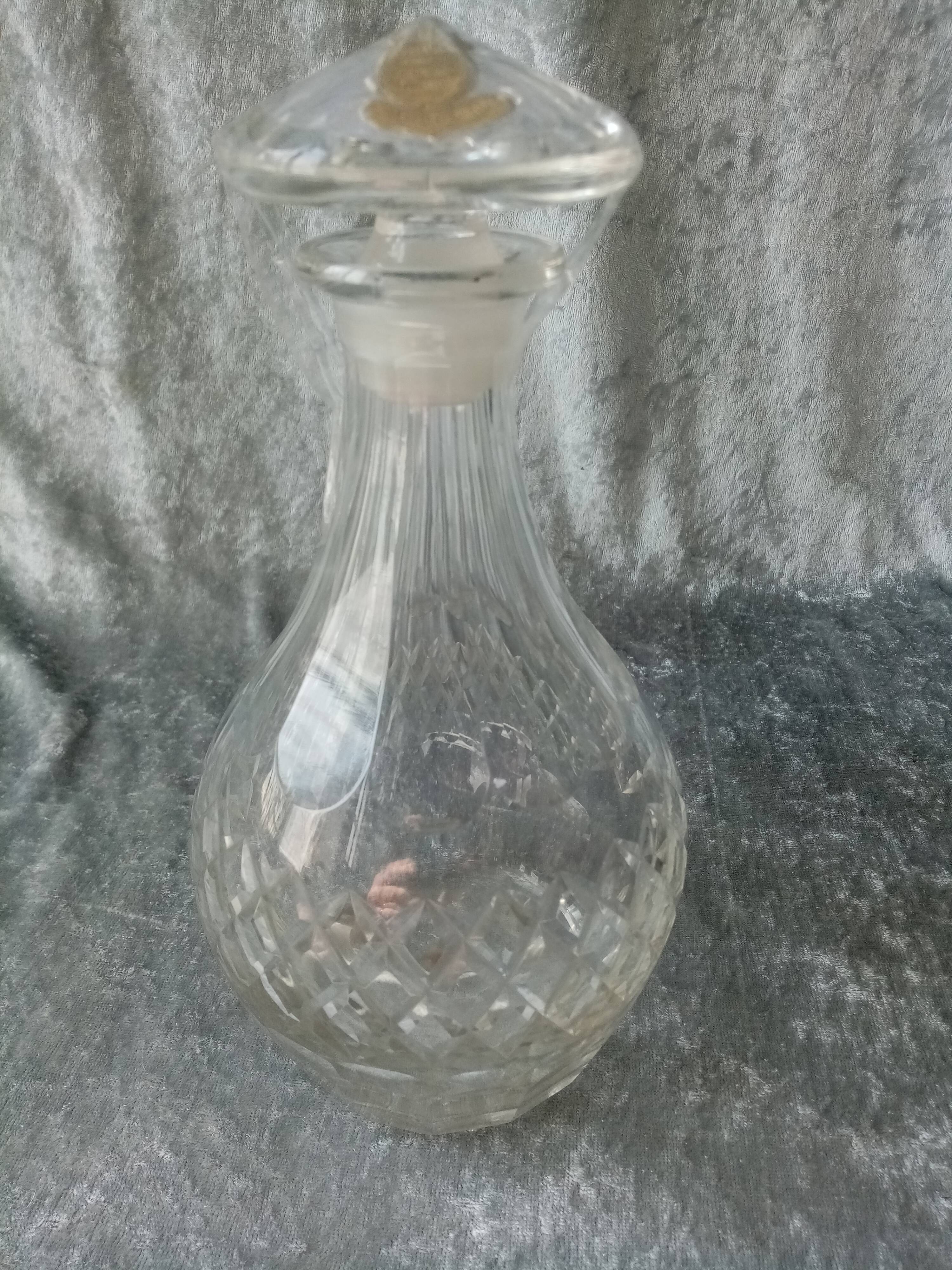 Saint Louis or Baccarat cut crystal carafe with store label