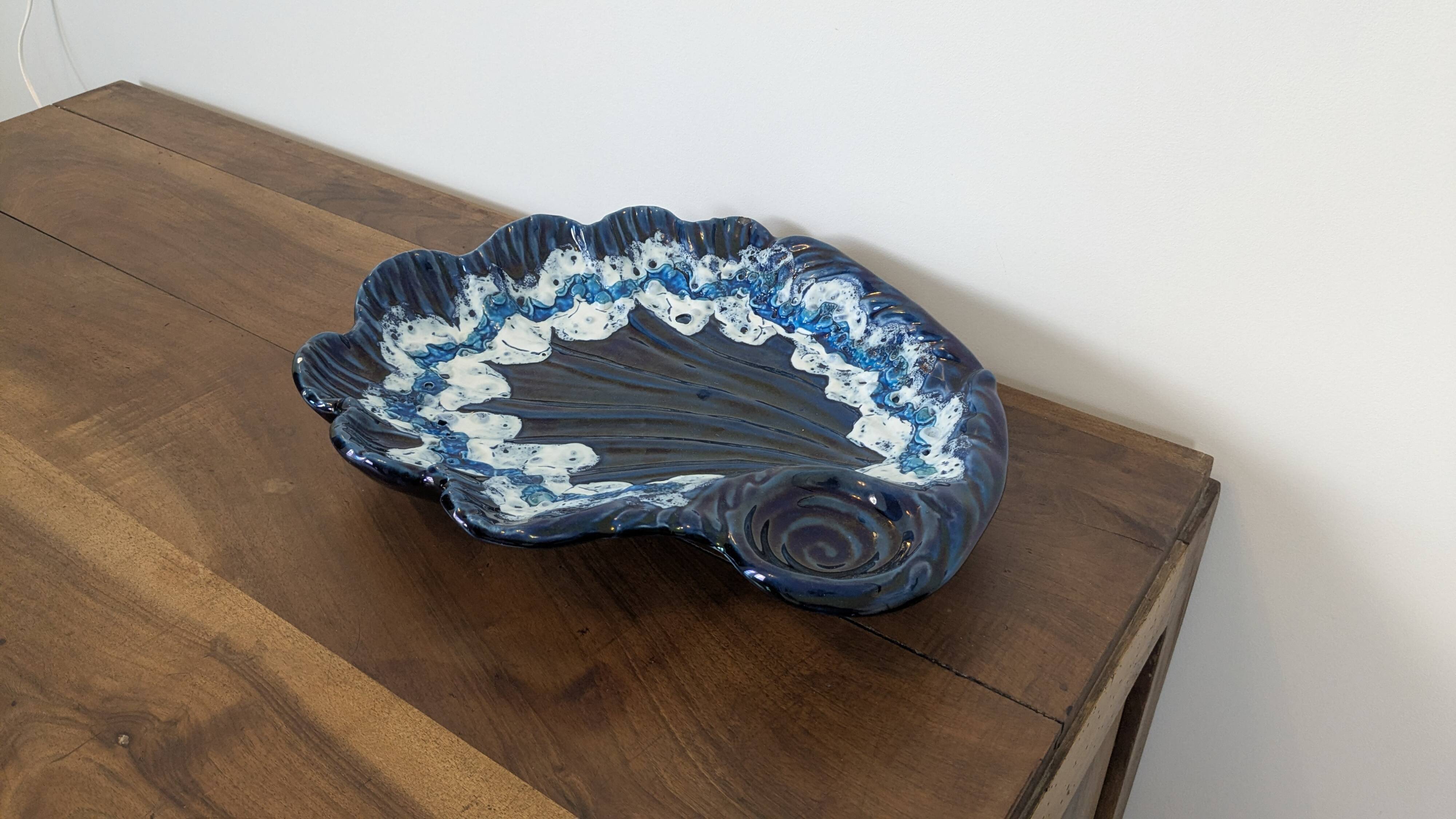 Large vintage shell-shaped blue glazed ceramic bowl