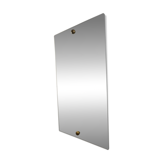 Wall mirror with gold buttons