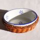 Set of 4 white porcelain dishes with blue decorations and wicker stands