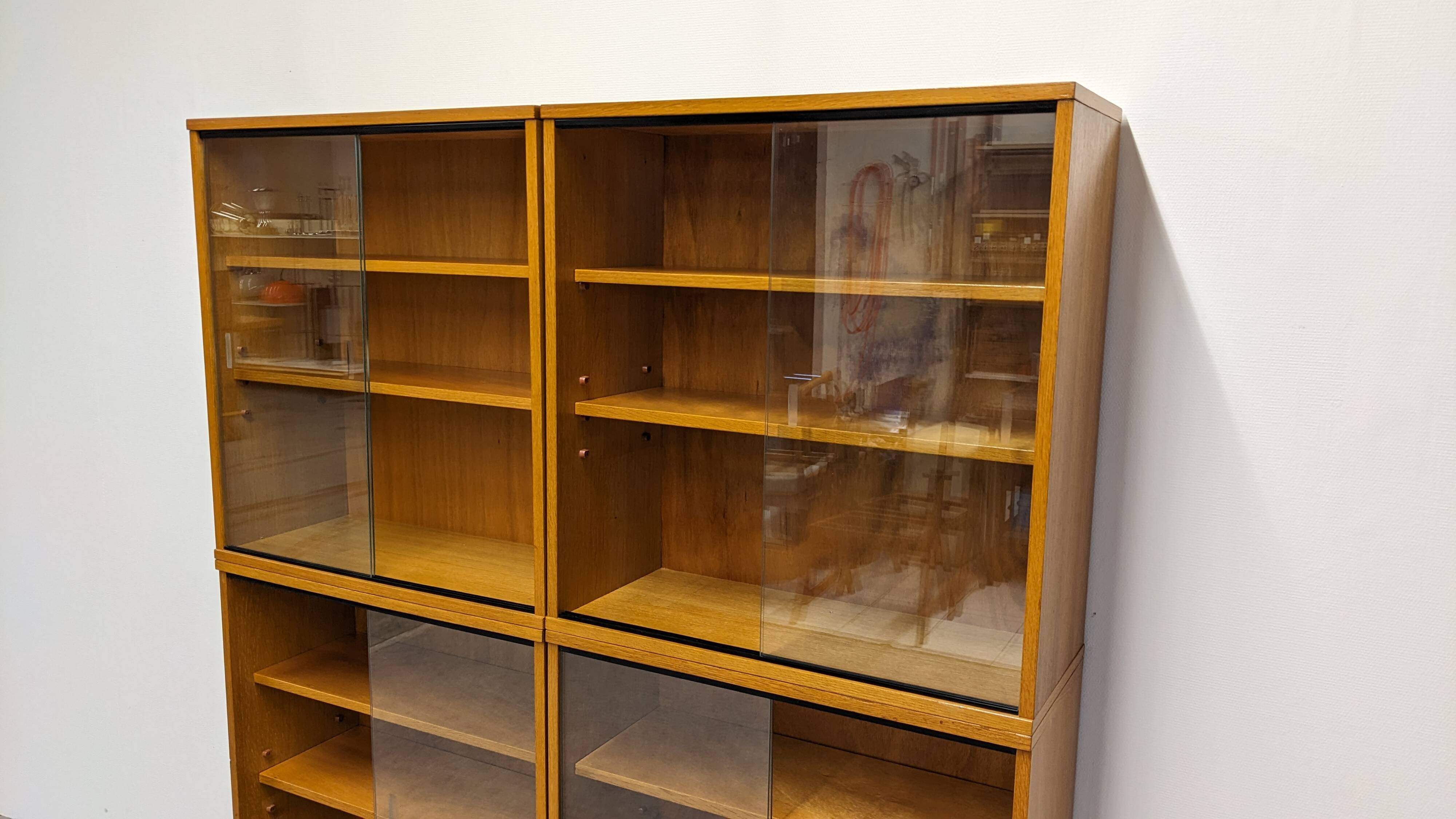 Library or display cabinet with 4 modules in light oak, France around 1960.