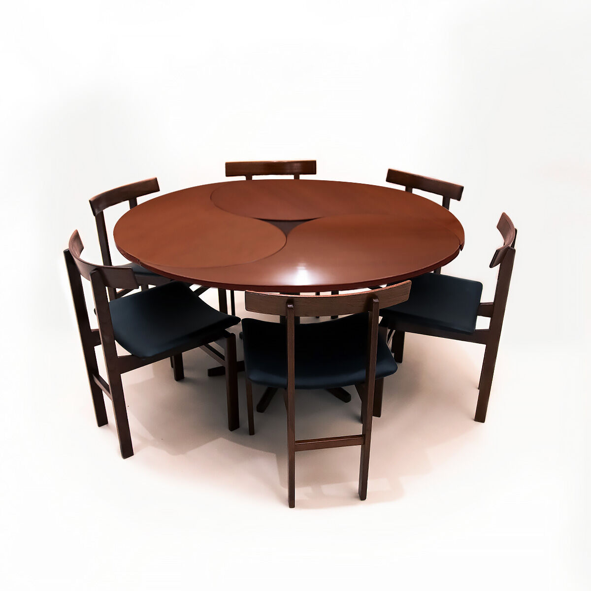 Danish Mid Century Yin-Yang teak extending dining table by Ole Gjerløv-Knudsen and Torben Lind