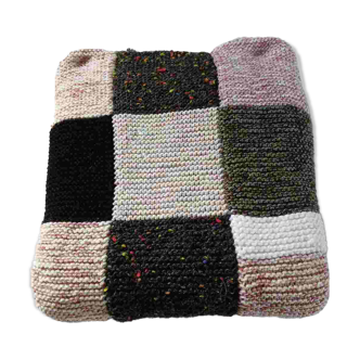 Hand-knitted patchwork plaid