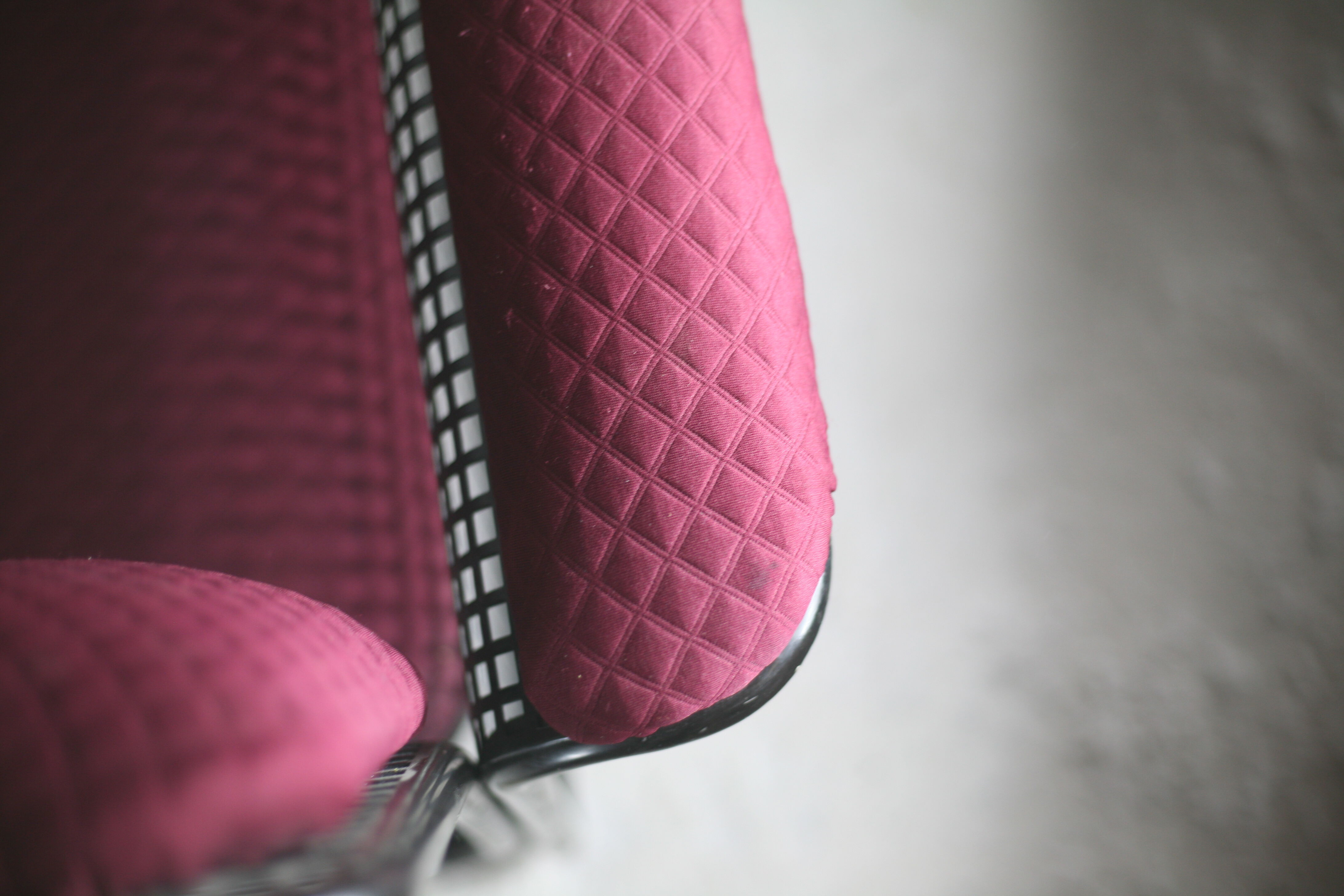 Black honeycomb steel sofa, burgundy fabrics, Italy, circa 1970