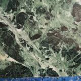 Coffee table in gilded bronze and green Alpine marble