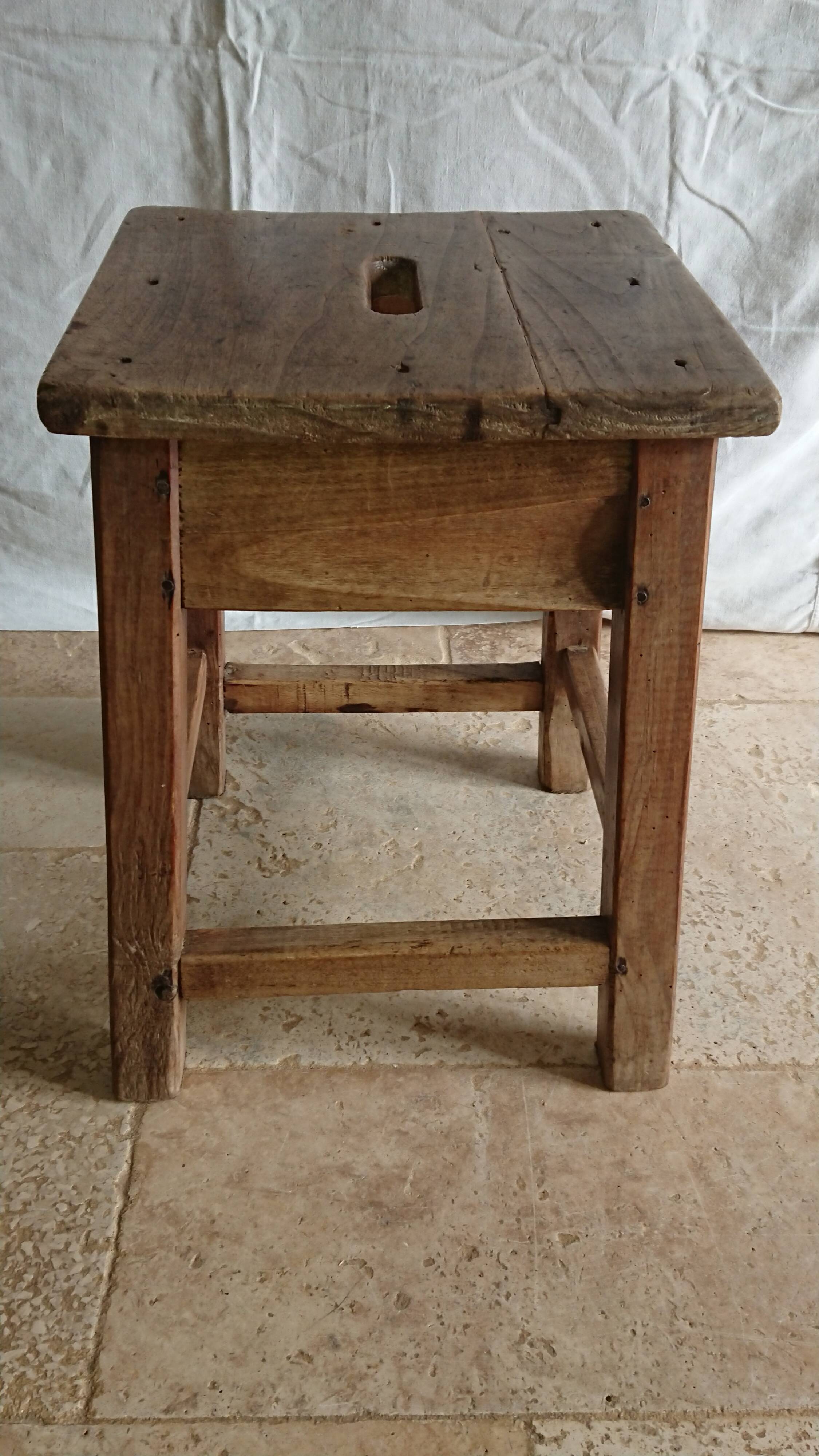 Raw wooden workshop stool