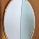 Free-form oval sheathed mirror from the 60s and 70s