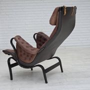 Années 1970, design suédois de Bruno Mathsson, modèle « Pernilla », cuir.