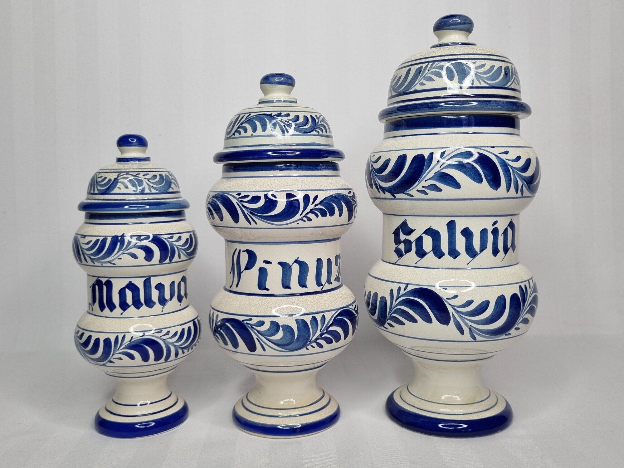 Set of three covered apothecary pots, Malva, Pinus, Salvia in glazed ceramic
