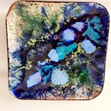 Empty blue enamel pocket