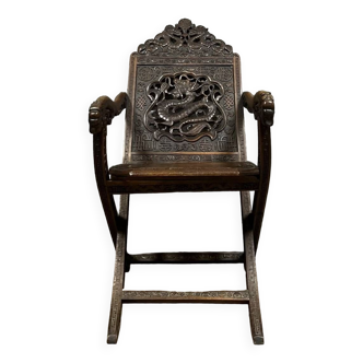 19th century China: Rare folding country armchair in carved walnut