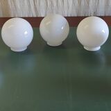 7 globes en opaline, milieu XXème