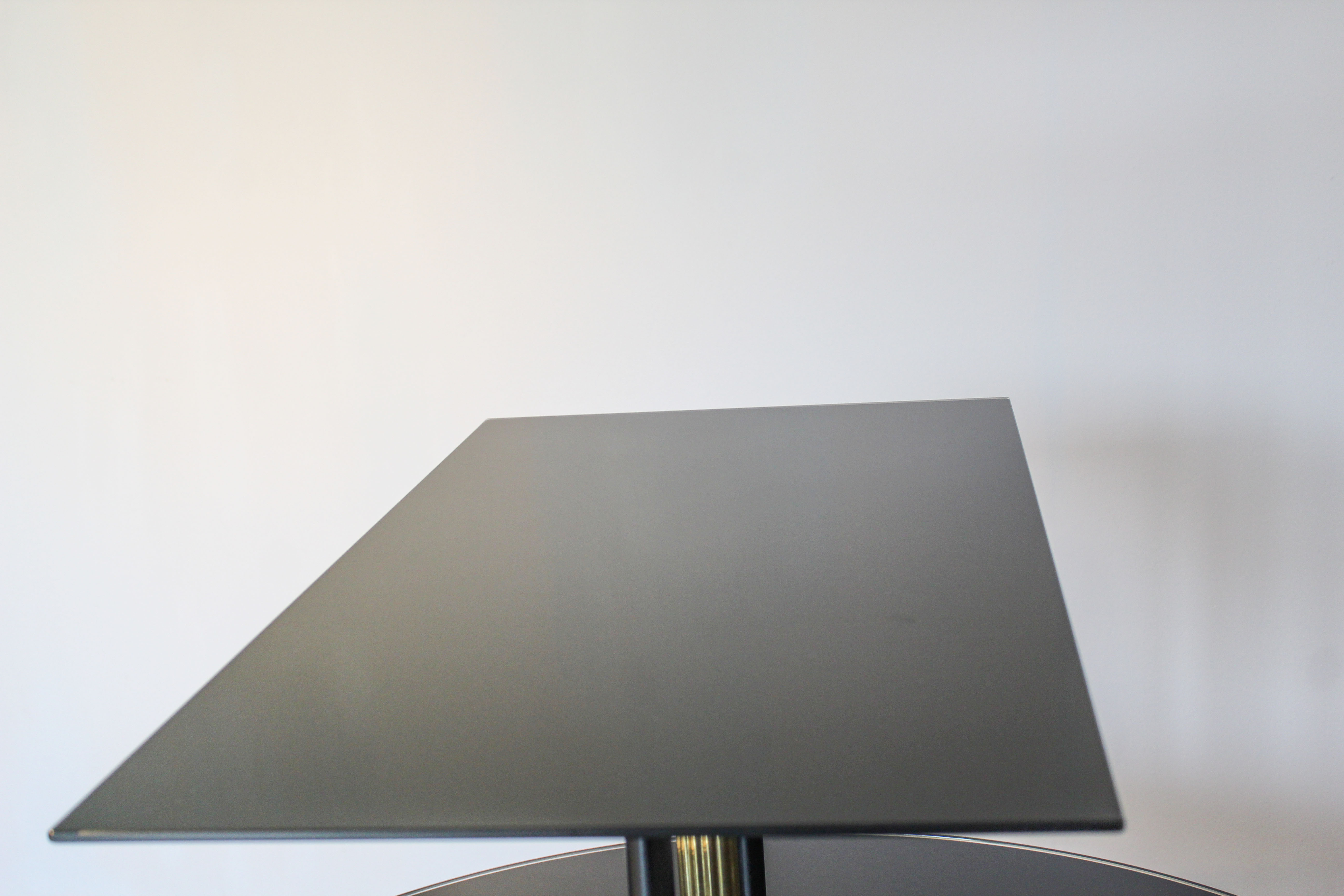 Coffee table in black glass lacquered brass and iron, Italy 50s