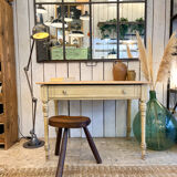 Old farmhouse table with central drawer