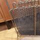 Modernist magazine rack in metal and wood