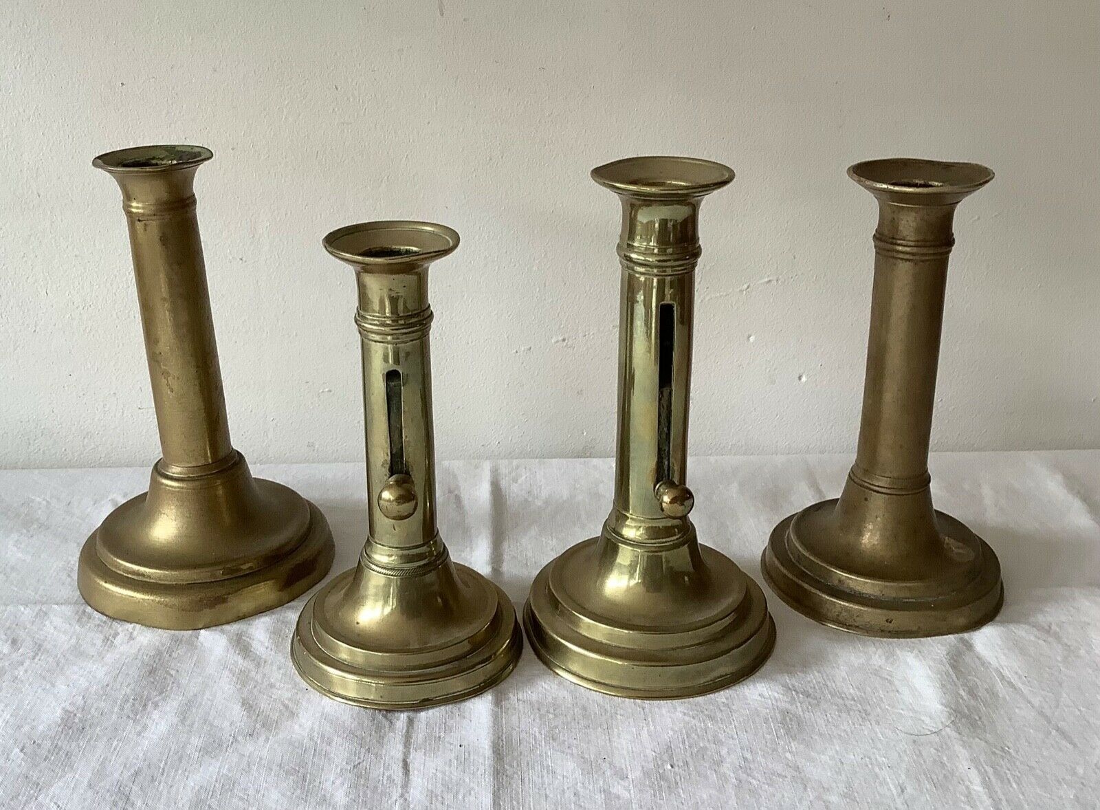 Lot of 4 old candlesticks