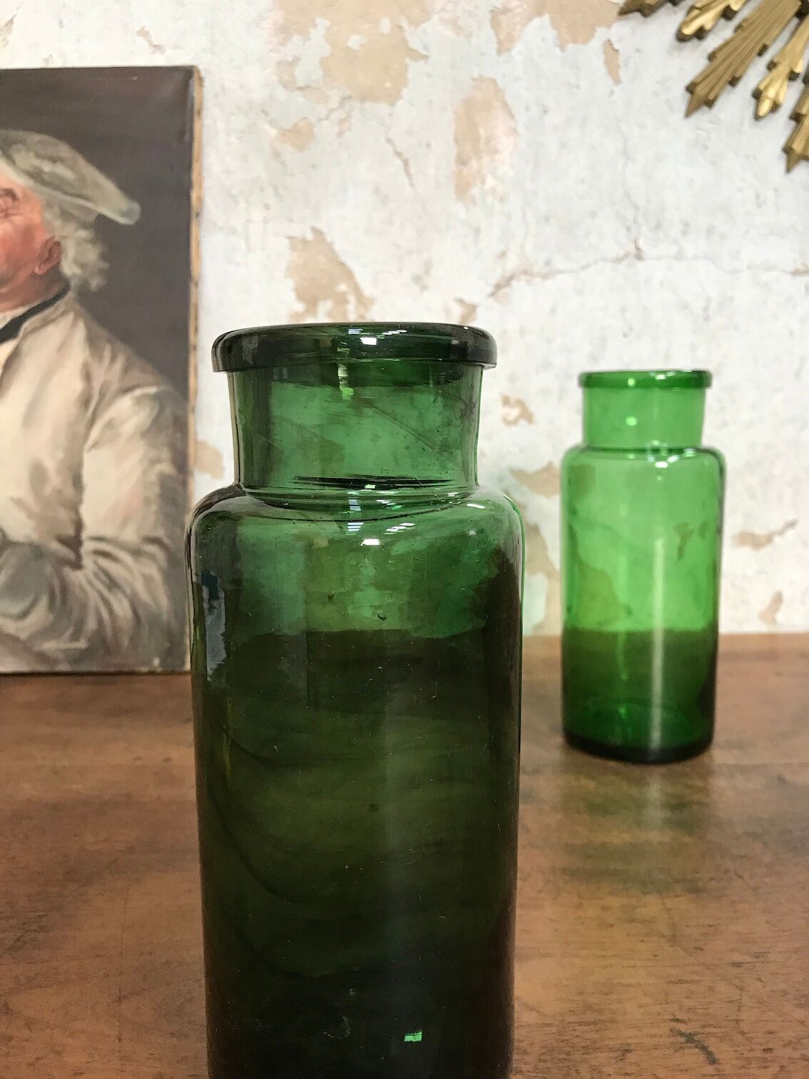 Green bubbled glass jars.