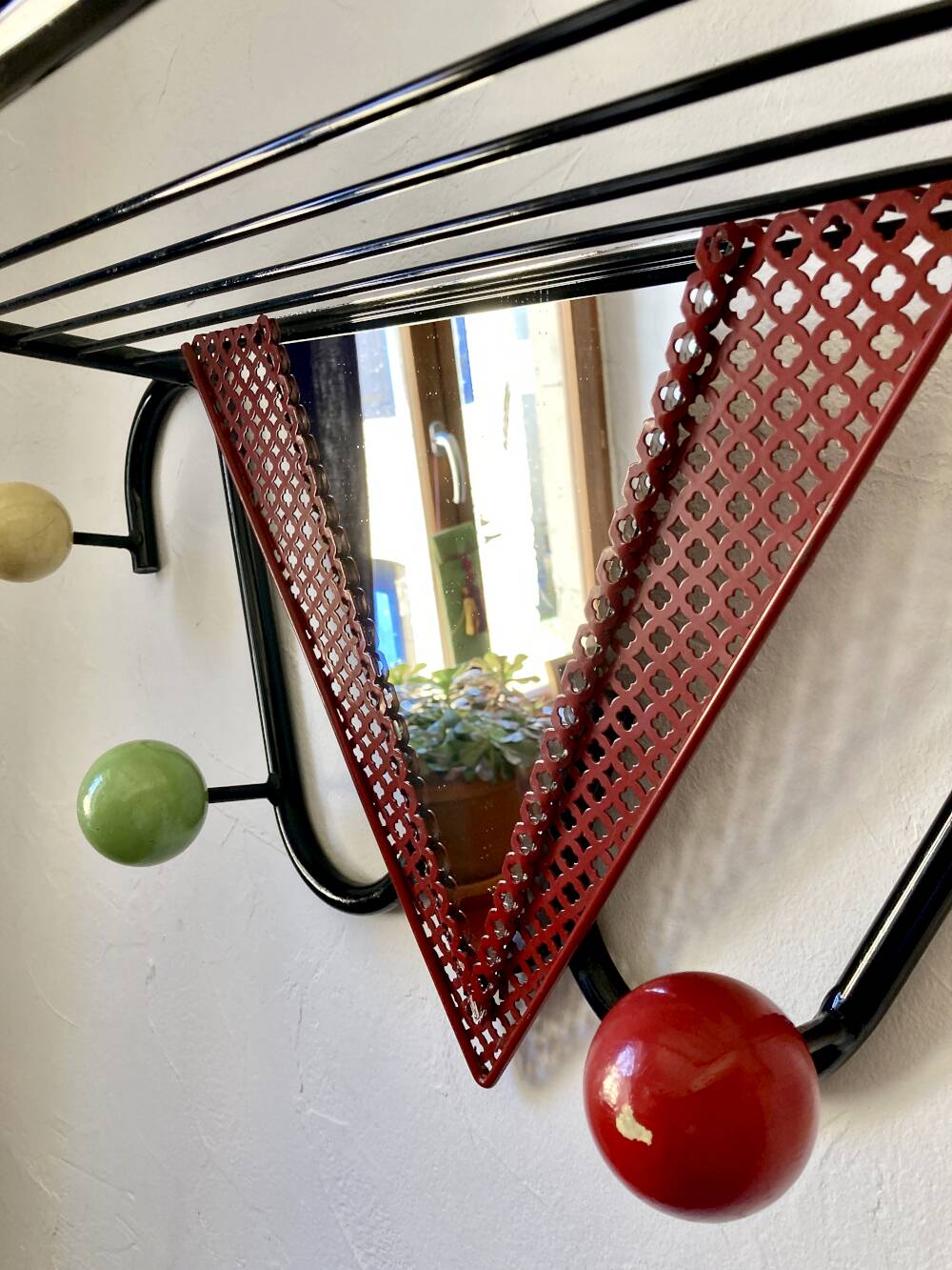 Wall coat rack, 1950s, attributed to Mathieu Matégot.