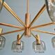Large designer chandelier in brass and smoked glass globes, 1970s