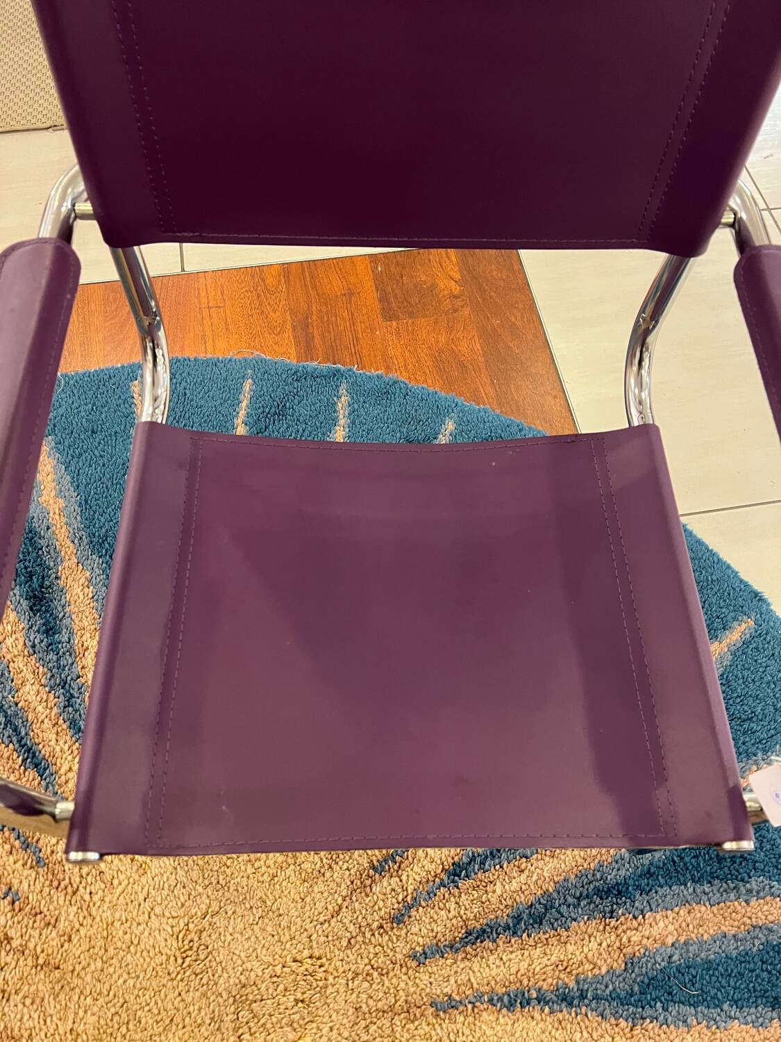 Purple cantilever armchair