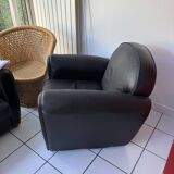 Matching black leather armchair – comfort and elegance