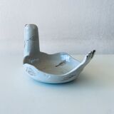 Large empty pocket or cup made of bird ceramic