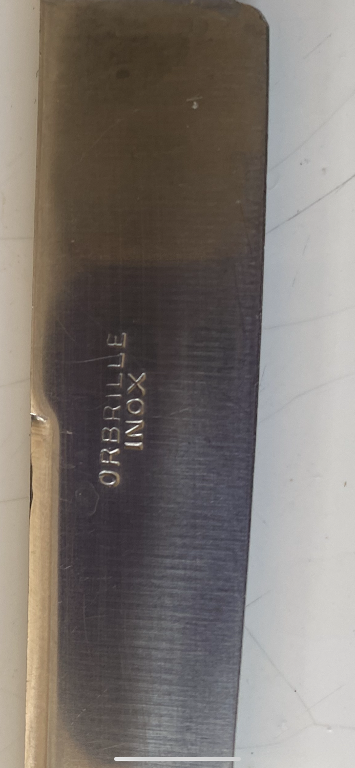 Box of silver metal knives