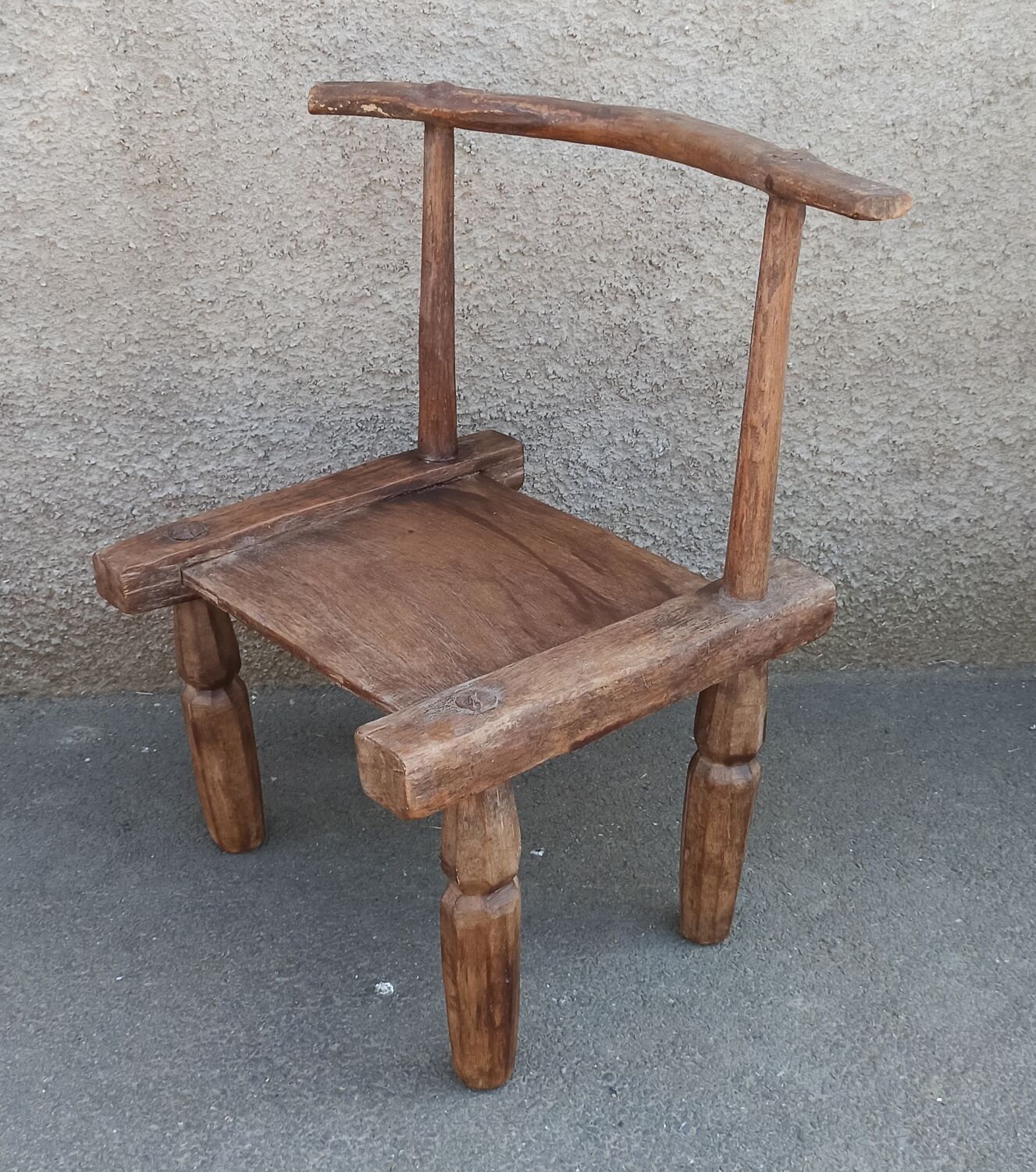 Antique wooden stool. Baoulé African art from Ivory Coast.