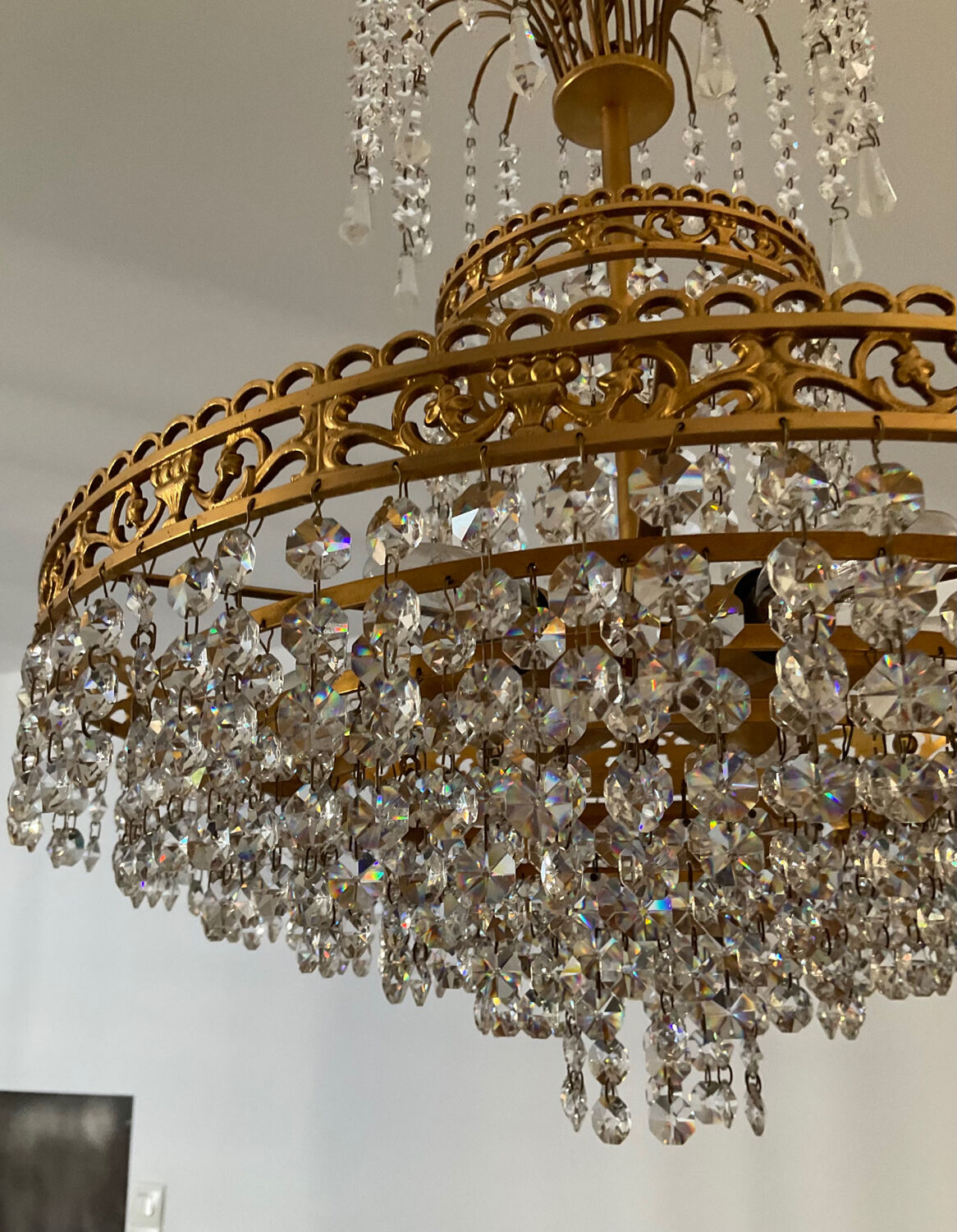 Cascade chandelier with crystal and bronze tassels