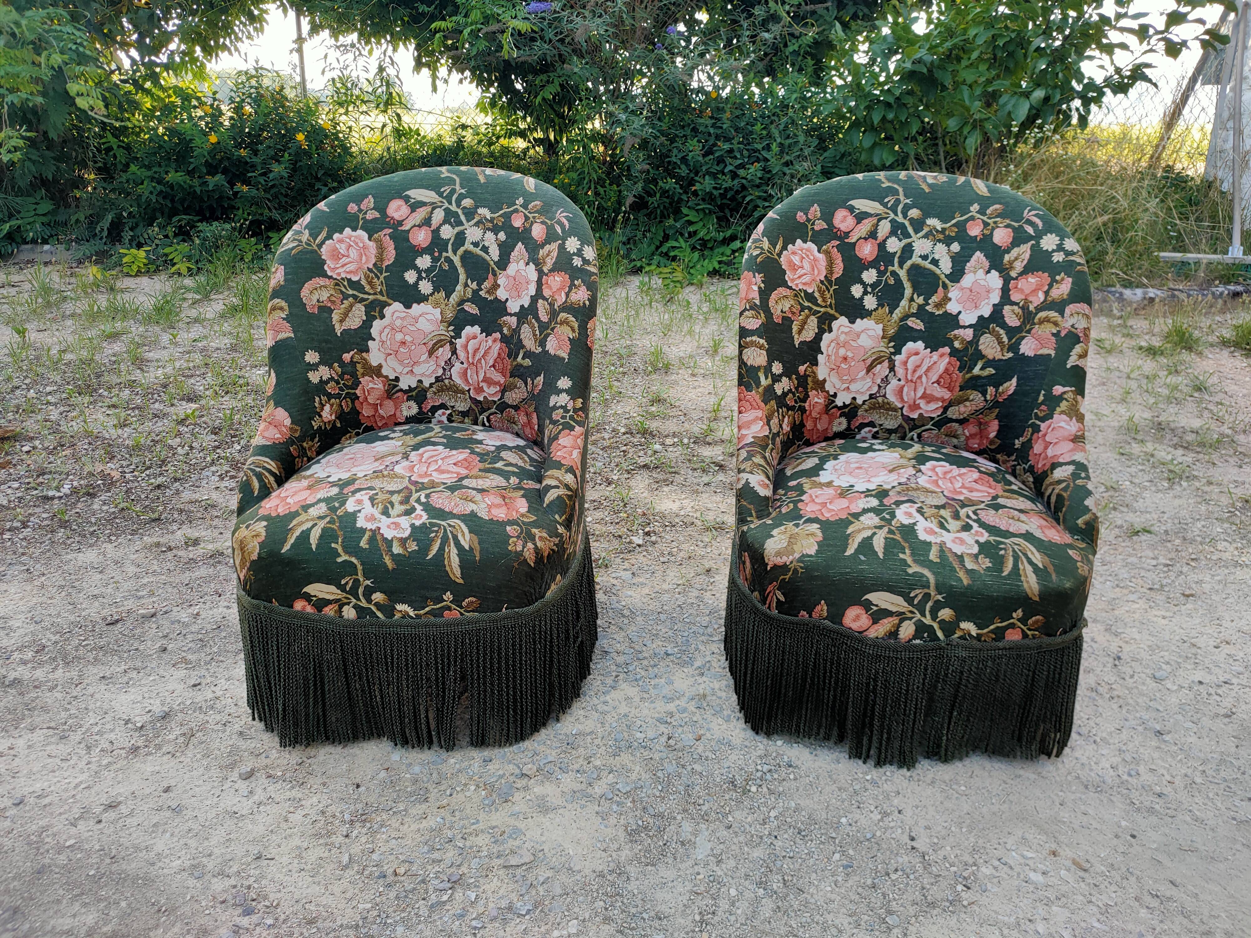 Two toad armchairs, floral motifs