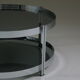 Round chrome-plated metal coffee table and smoked glass tops, France 1970s