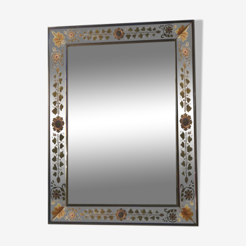 Multi-colored and brass pareclose mirror