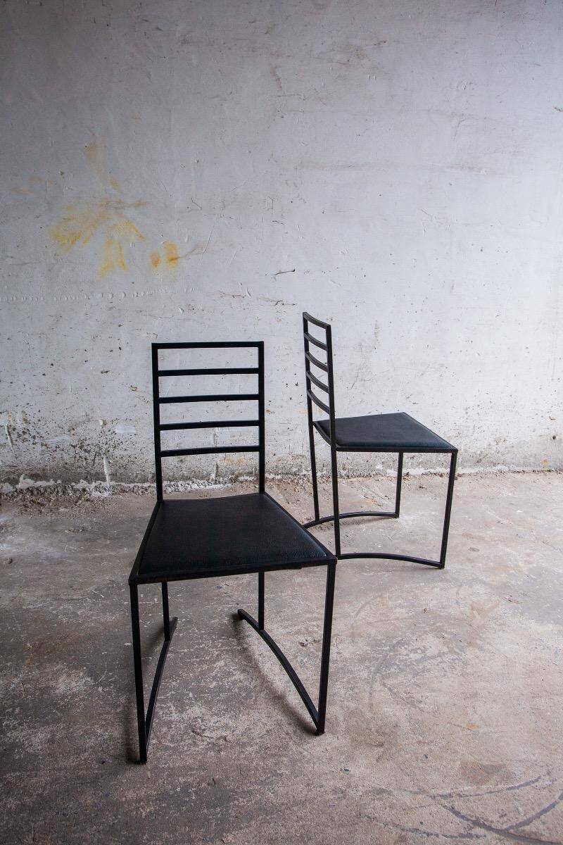 Set of 4 Black Steel Dining Chairs with Black Faux-Leather Seats — Minimalist Geometric Design