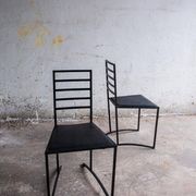 Set of 4 Black Steel Dining Chairs with Black Faux-Leather Seats — Minimalist Geometric Design