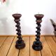 Pair of old turned wooden candlesticks