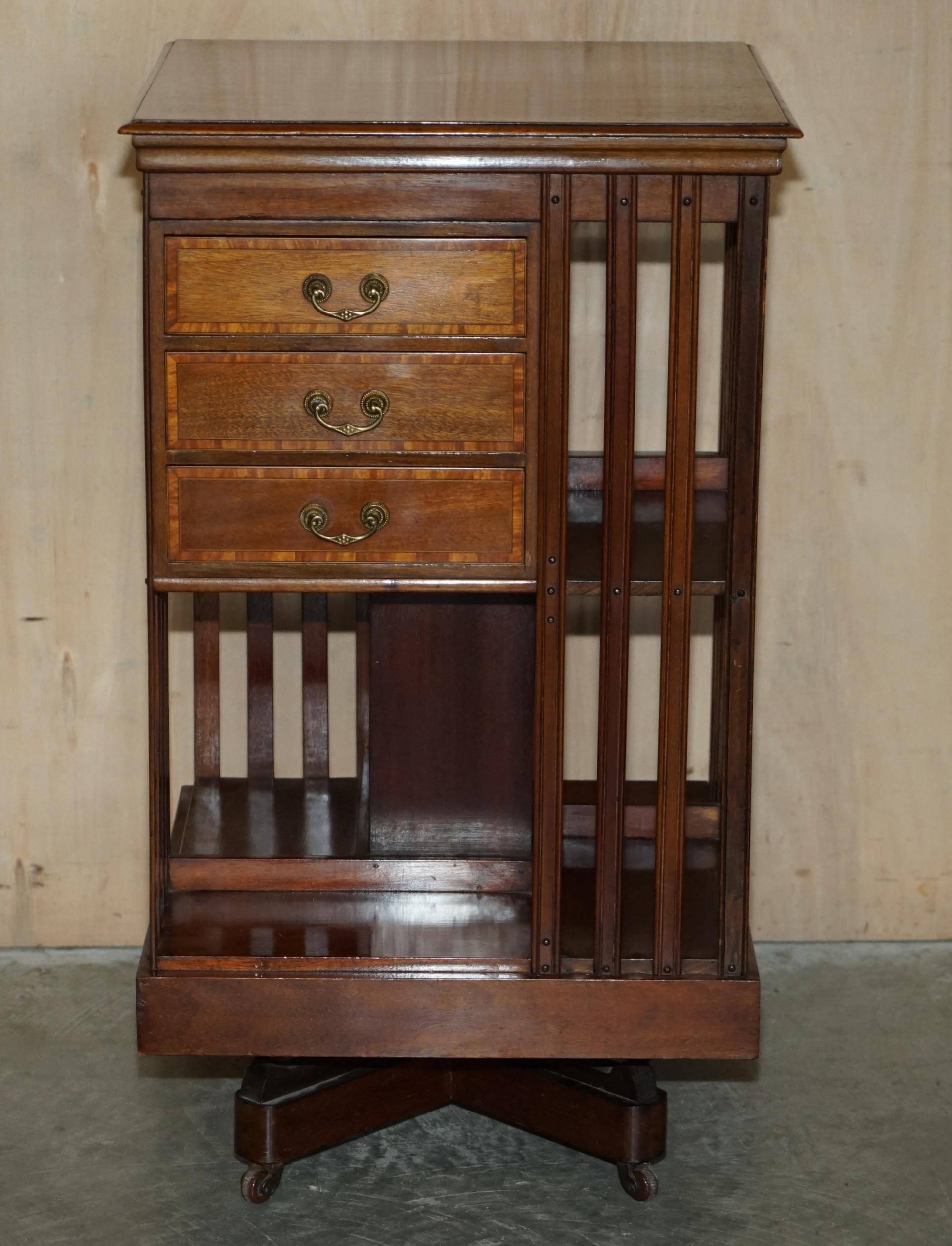 Restored Victorian walnut revolving library.