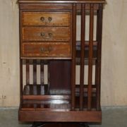 Restored Victorian walnut revolving library.